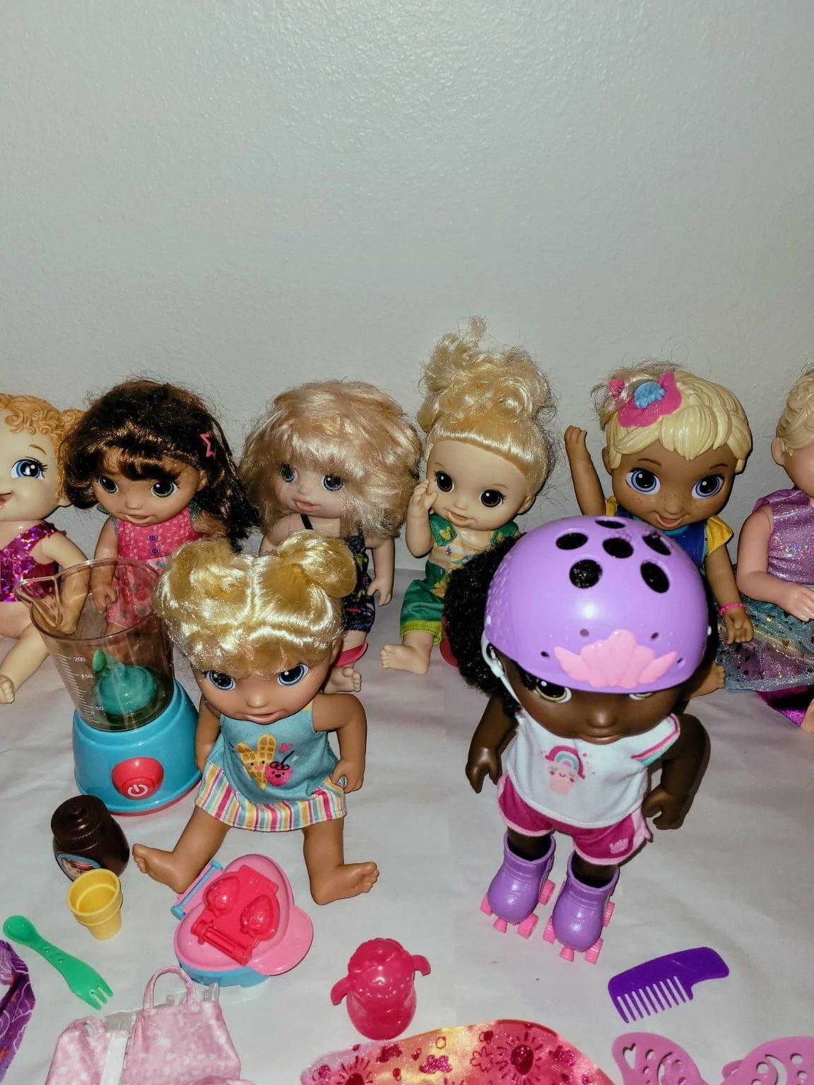 Lot Of 8 Baby Alive Baby Dolls and Accessories Great Condition
