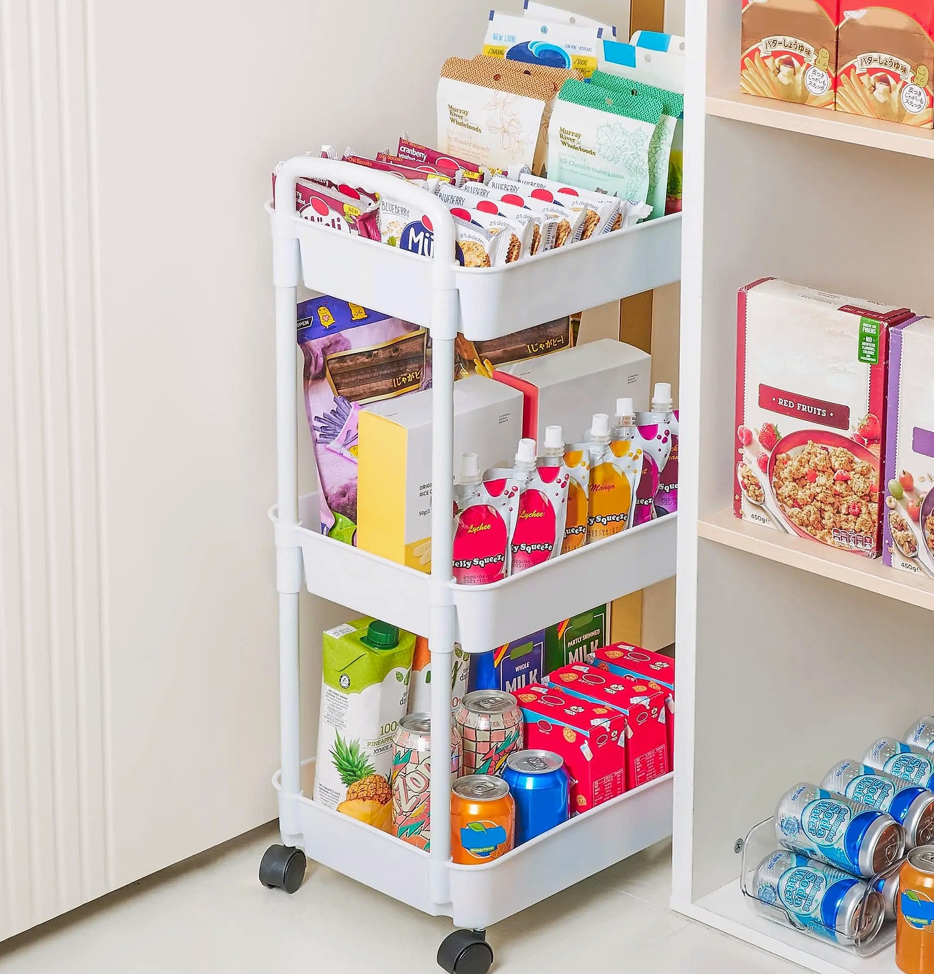 Rolling utility cart with lockable wheels and storage baskets