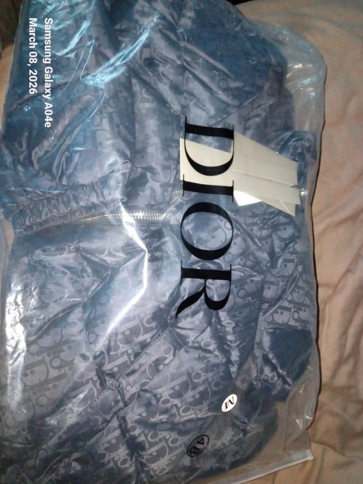 Christian Dior  |  Light Blue Oblique Puffer Jacket  Size 46